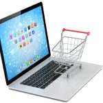 Shopping cart on laptop. 3d rendering.