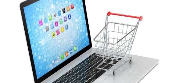 Shopping cart on laptop. 3d rendering.